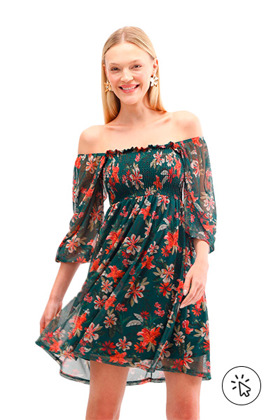 Modelo veste vestido feminino de tule floral verde - 7 estilos universais - quais são os 7 estilos universais - quem criou os 7 estilos universais - estilo romântico