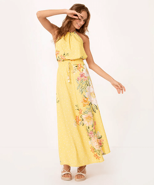Modelo usa saia midi de viscose jardim solar amarelo, sugestão para look estilo romântico