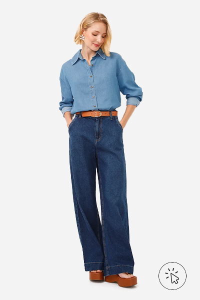 Modelo veste camisa de liocel manga longa barra assimétrica azul jeans - roupas anos 90 - look anos 90 - moda anos 90 - como era a moda nos anos 90