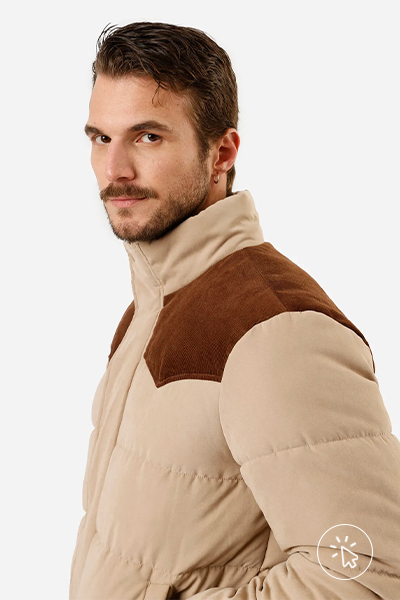 A foto está só na parte de cima, o modelo está com uma jaqueta puffer bege - aerolook masculino
